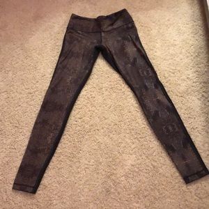 Lulu lemon black and gold leggings.